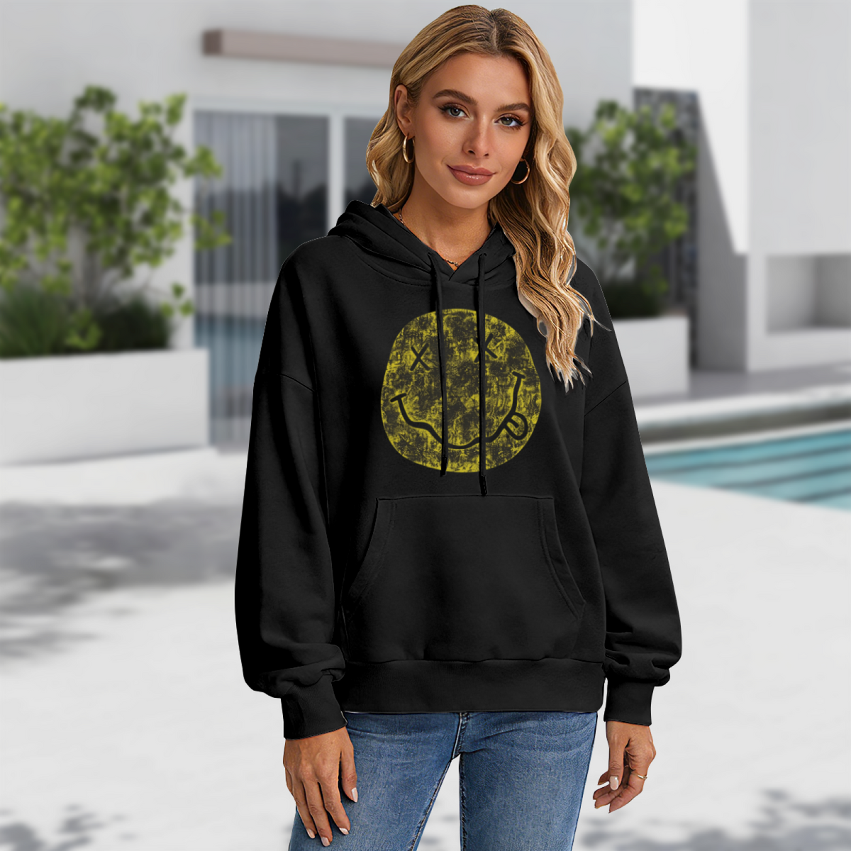 Hoodie product image with distressed yellow smiley artwork