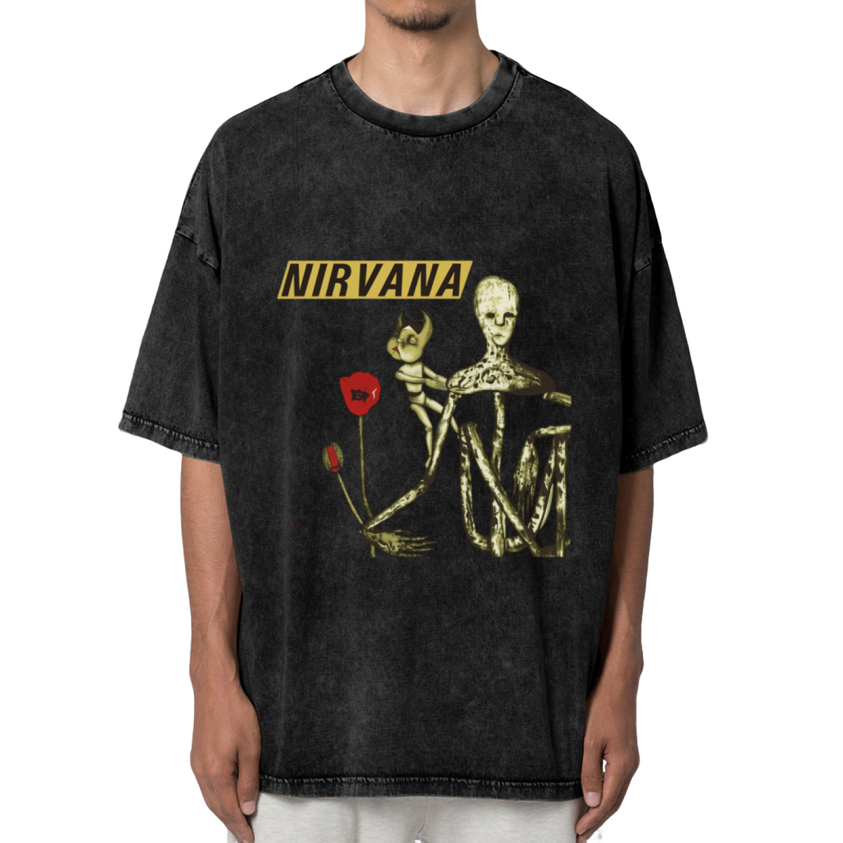 Nirvana Incesticide Album Washed Graphic Tee in Black, product image showing incesticide-inspired album imagery combining a doll figure and red poppy details.
