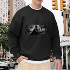 An armored figure in a smoky grayscale panel with lettering visible on a men's crewneck sweatshirt in an outdoor front model view