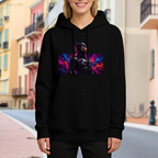 Lifestyle image outdoors: women's hoodie with a front graphic of an armored cowl portrait surrounded by electric pink and blue light