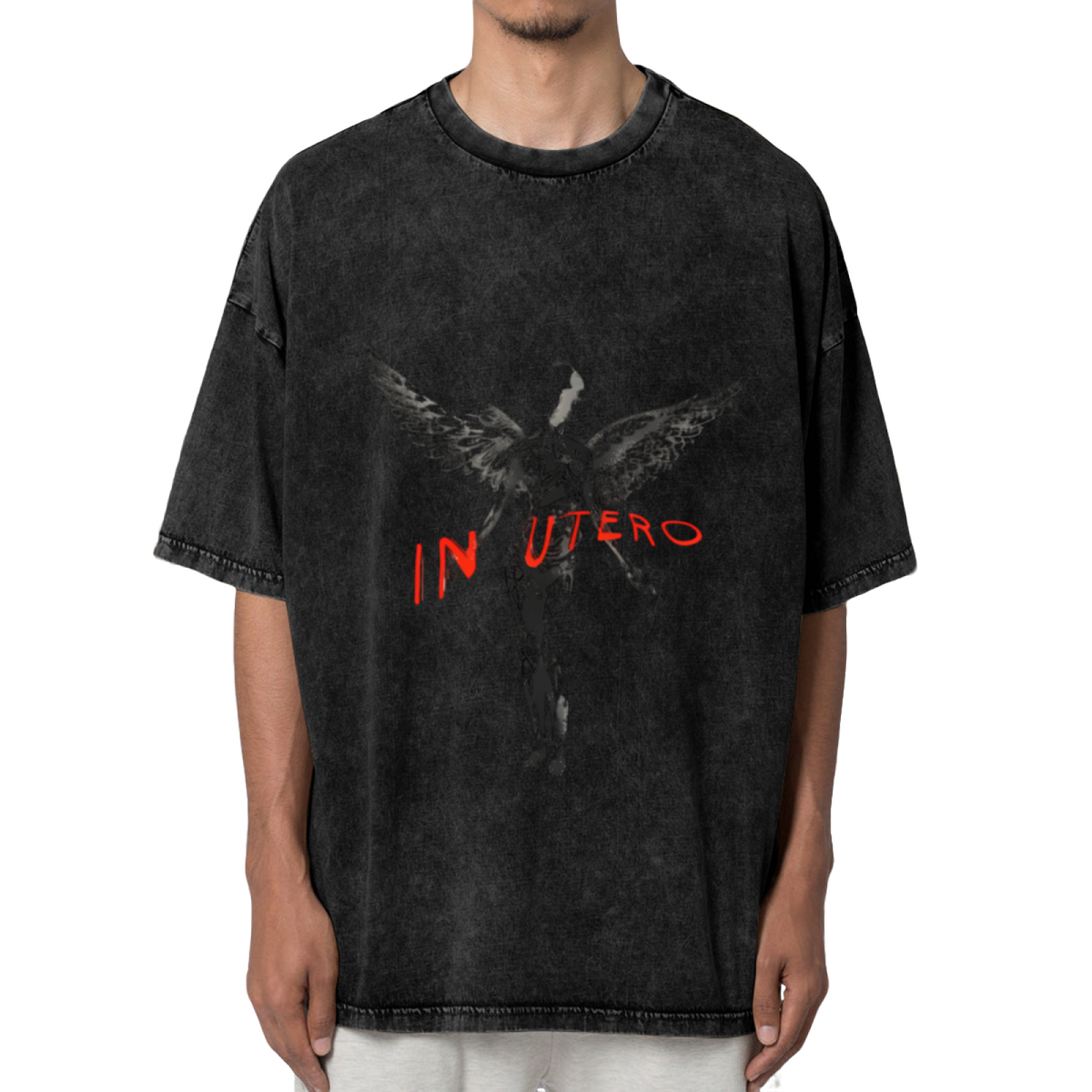 Nirvana In Utero Dark Angel Washed Tee in Black, product image showing an In Utero-inspired dark angel image with red typography.