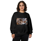 Women's crewneck sweatshirt seen on a model, its front graphic depicting a trident-bearing cat surrounded by surging waves in a sea battle