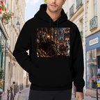 Lifestyle image outdoors: men's hoodie with a front graphic of a feline throne scene with gathered figures and warm firelight
