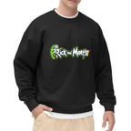 Studio photograph of a model in a men's crewneck sweatshirt showing two cartoon figures beside stylized lettering and a green portal