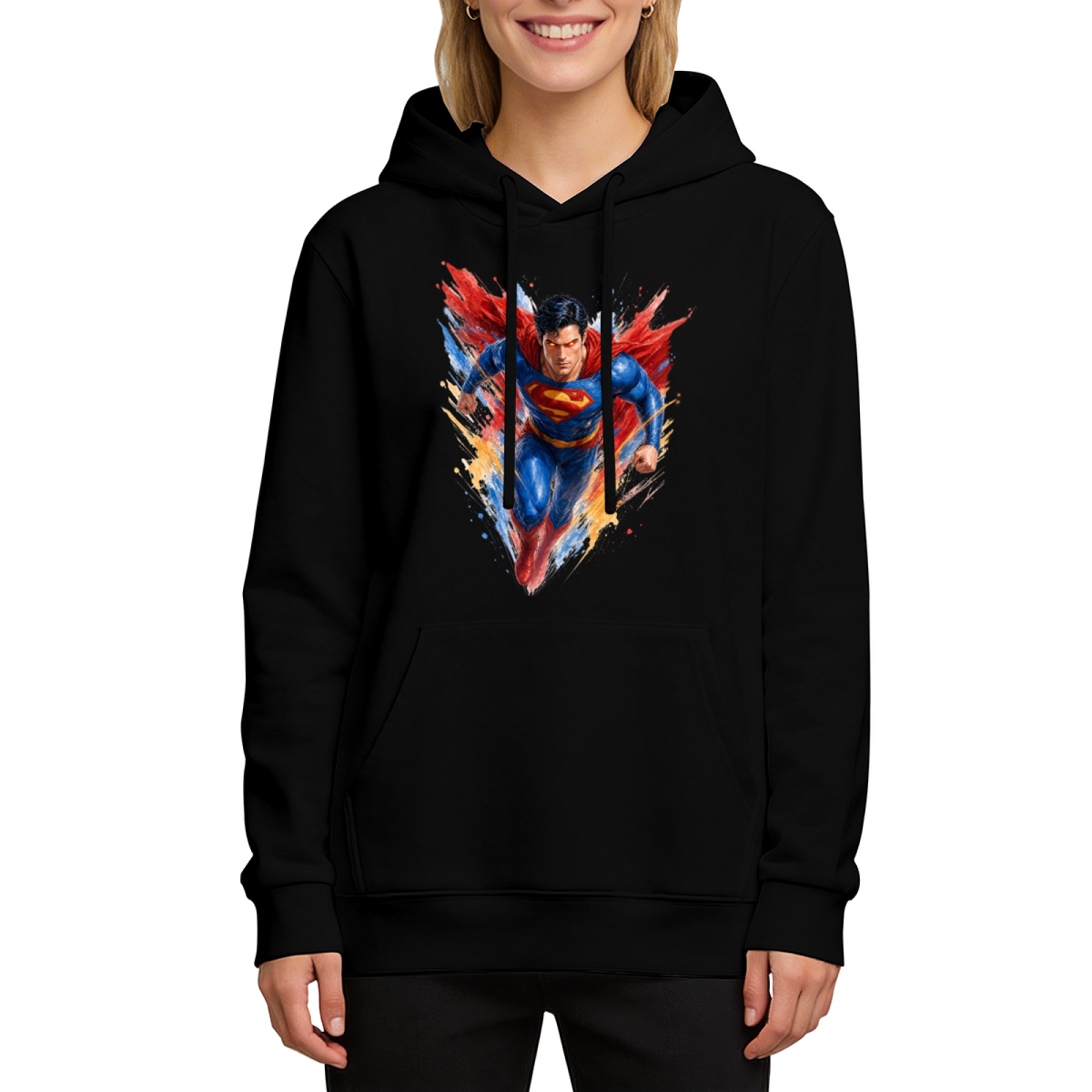 Studio photograph of a model in a women's hoodie showing a flying caped figure amid sharp multicolored brushstrokes