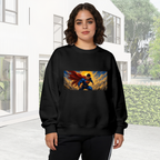 Outdoor photograph of a model in a women's crewneck sweatshirt bearing a flying caped figure crossing a golden panoramic sky